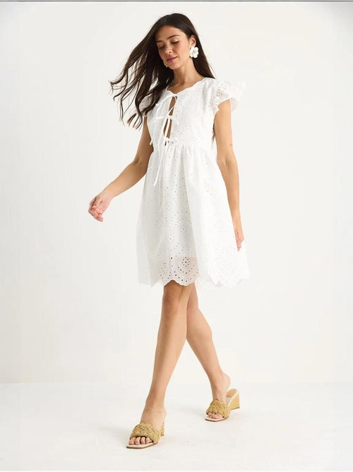 Minivestido con detalle de lazo y forro de ojales lucci - Kiabi Minivestido con detalle de lazo y forro de ojales lucci - Kiabi