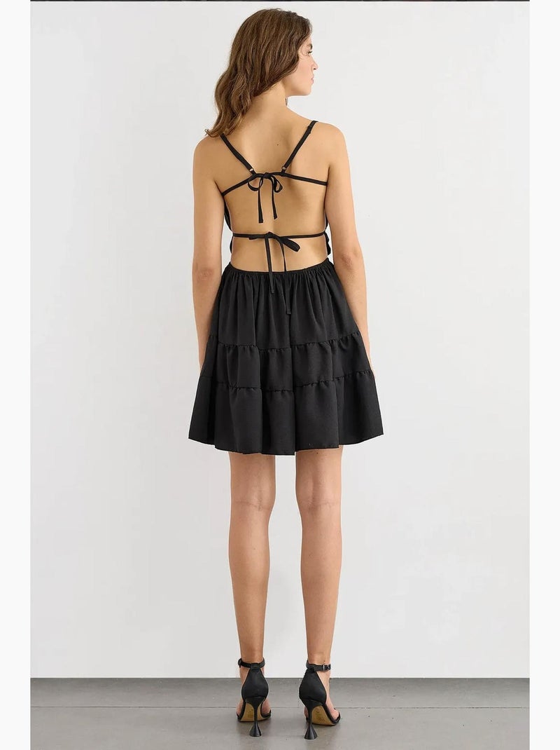 Minivestido de algodón con detalle de lazo hiccup Negro - Kiabi