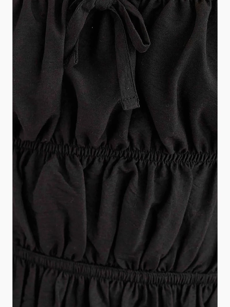Minivestido de algodón con detalle de lazo hiccup Negro - Kiabi