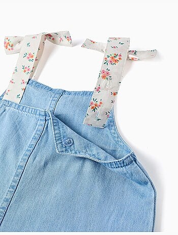 Mono corto vaquero sin mangas con tirantes florales
