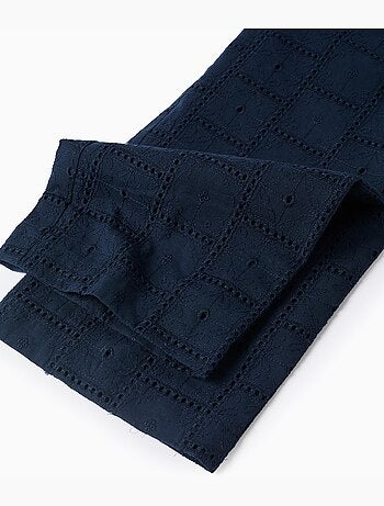 Mono de algodón con bordado inglés y volantes