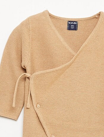 Mono de punto con abertura cruzada