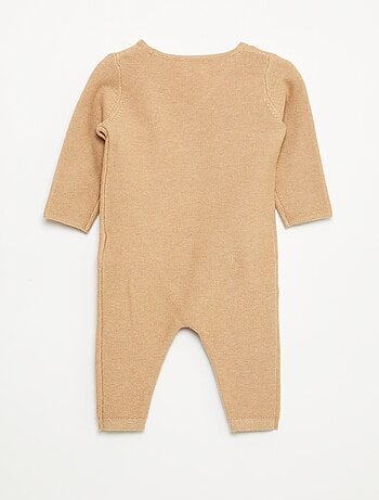 Mono de punto con abertura cruzada