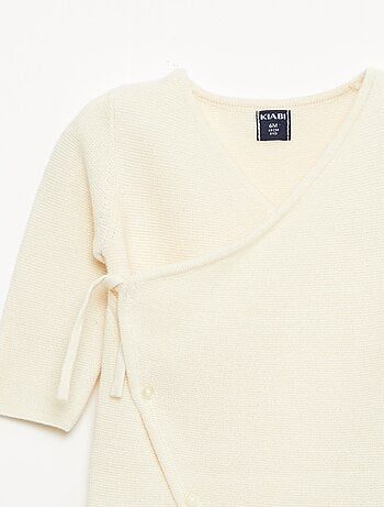 Mono de punto con abertura cruzada