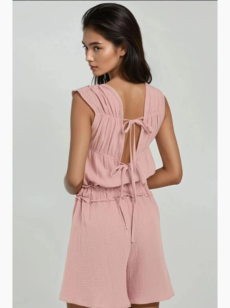 Mono texturizado de pierna corta con cuello redondo hiccup Rosa almendra - Kiabi