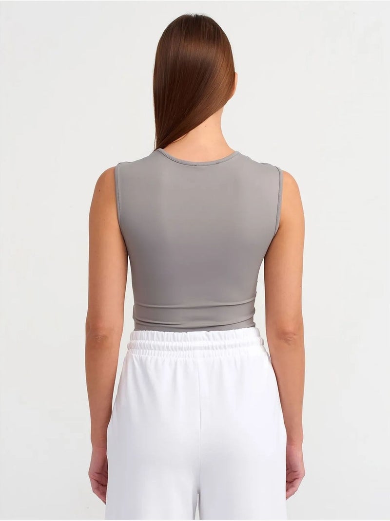 Mono unitard sin costuras sin mangas de corte slim dilvin Gris - Kiabi