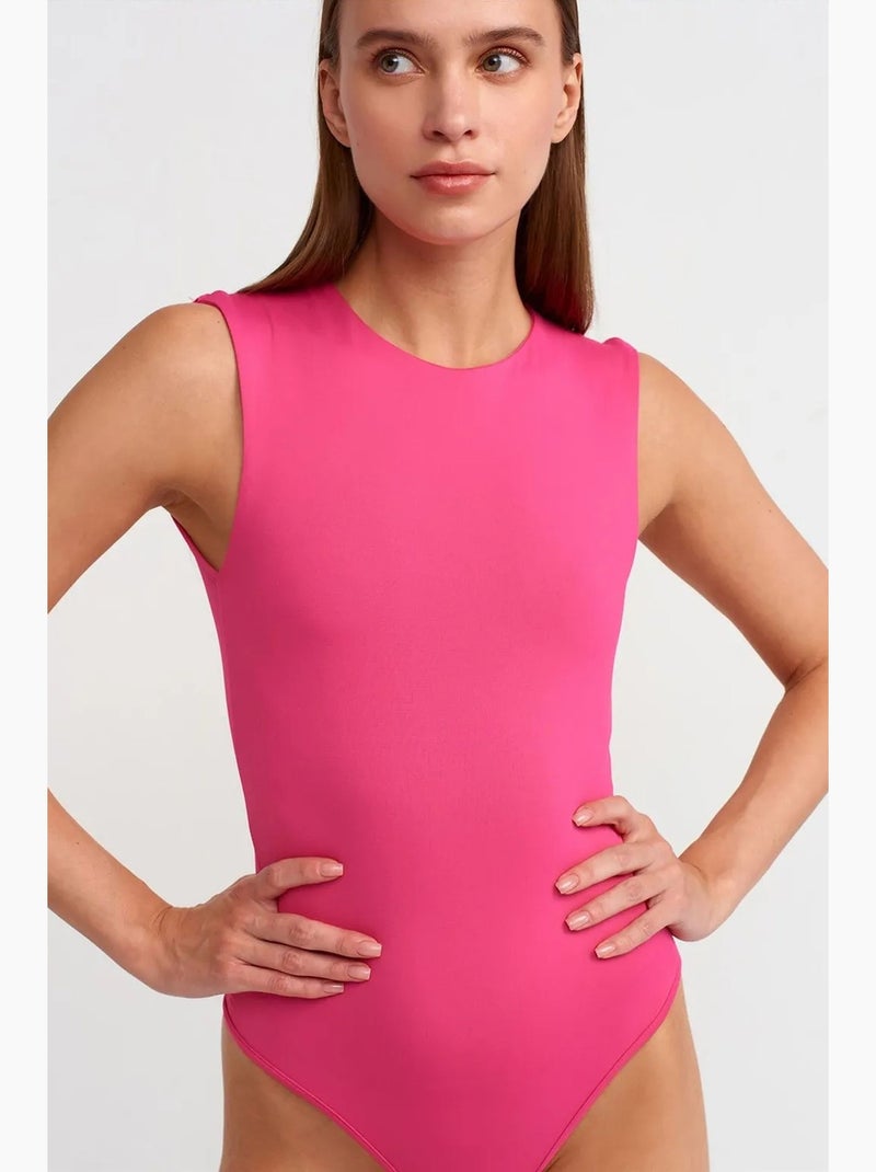 Mono unitard sin costuras sin mangas de corte slim dilvin Rosa fluo/Solinotes - Kiabi