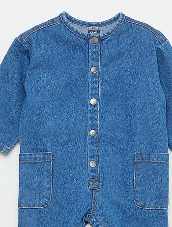 Mono vaquero con bolsillos de parche