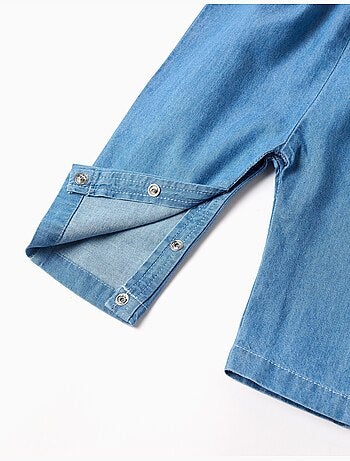 Mono vaquero con flores bordadas