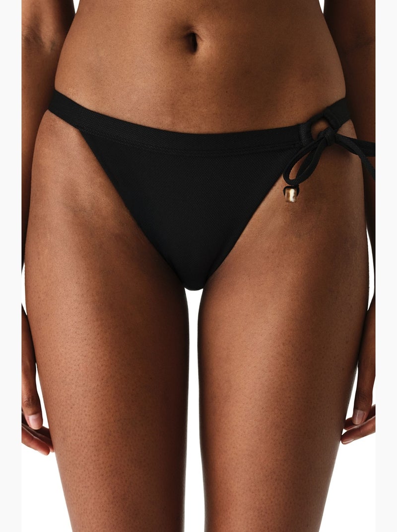 Montana braguita de bikini con textura lateral y talle medio penti Negro - Kiabi