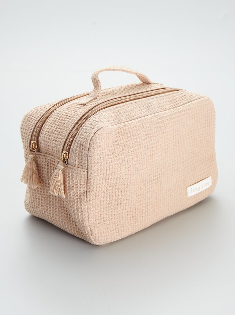 Neceser de punto gofrado con parche con mensaje beige - Kiabi