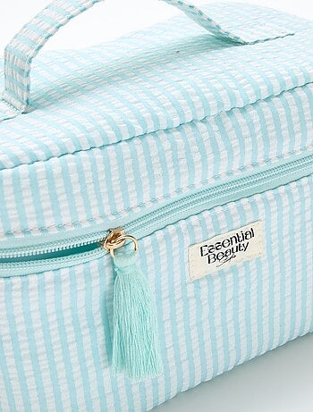 Neceser estampado con asa de transporte