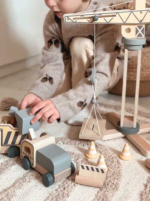 Obra de construcción madera grúa y vehículos Mamabrum - Kiabi