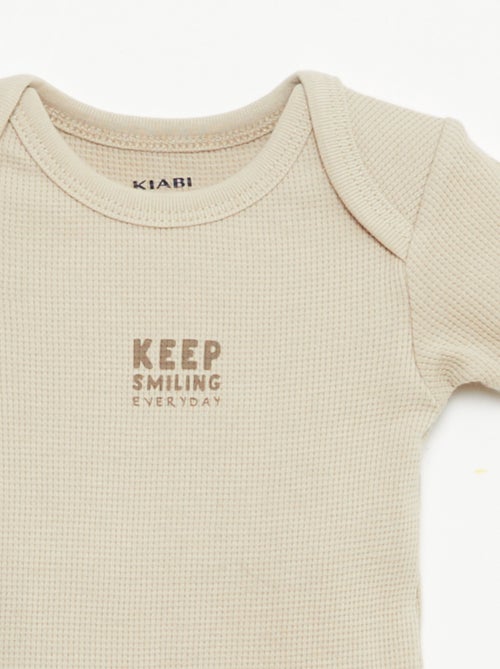 Pack body evolutivo + pijama en punto canalé - Kiabi
