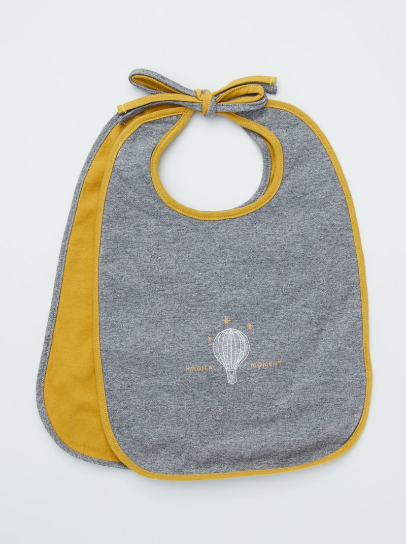 Pack de 2 baberos de tela con lazo BEIGE - Kiabi