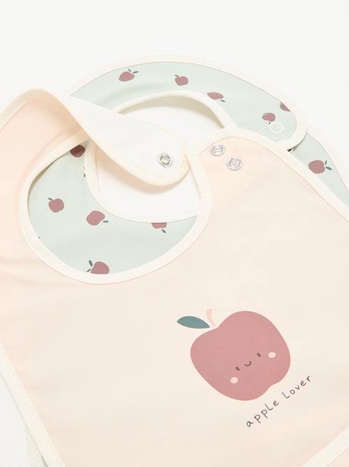 Pack de 2 baberos impermeables con estampado - Kiabi Pack de 2 baberos impermeables con estampado - Kiabi