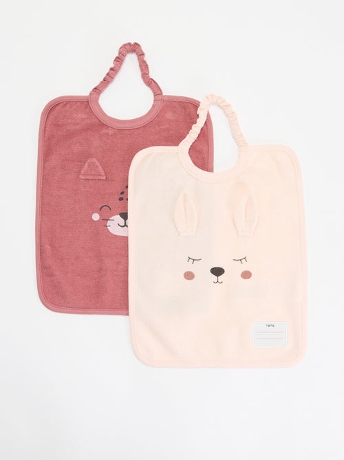 Pack de 2 baberos para poner por la cabeza - Kiabi Pack de 2 baberos para poner por la cabeza - Kiabi