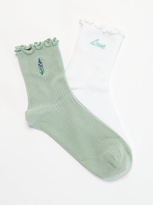 Pack de 2 calcetines bordados con bordes con volantes - Kiabi Pack de 2 calcetines bordados con bordes con volantes - Kiabi
