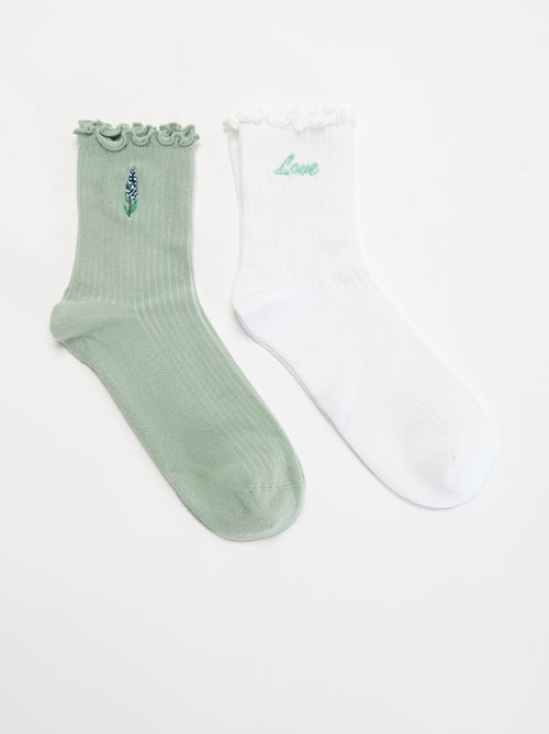 Pack de 2 calcetines bordados con bordes con volantes - Kiabi Pack de 2 calcetines bordados con bordes con volantes - Kiabi