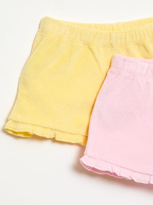 Pack de 2 pantalones cortos lisos de rizo con volantes - Kiabi