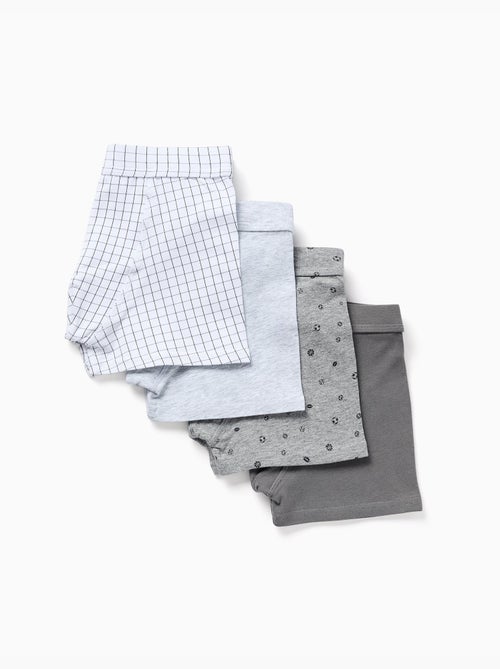 Pack de 4 bóxers de algodón lisos/estampados - Kiabi Pack de 4 bóxers de algodón lisos/estampados - Kiabi