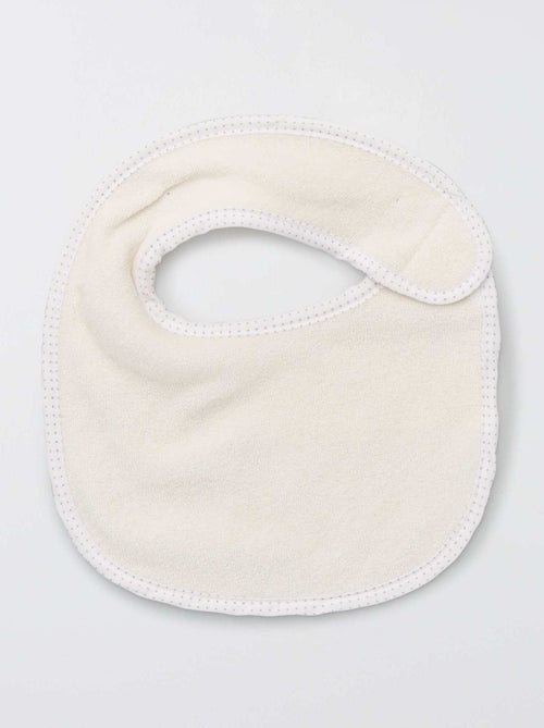 Pack de 7 baberos de rizo con velcro - Kiabi Pack de 7 baberos de rizo con velcro - Kiabi