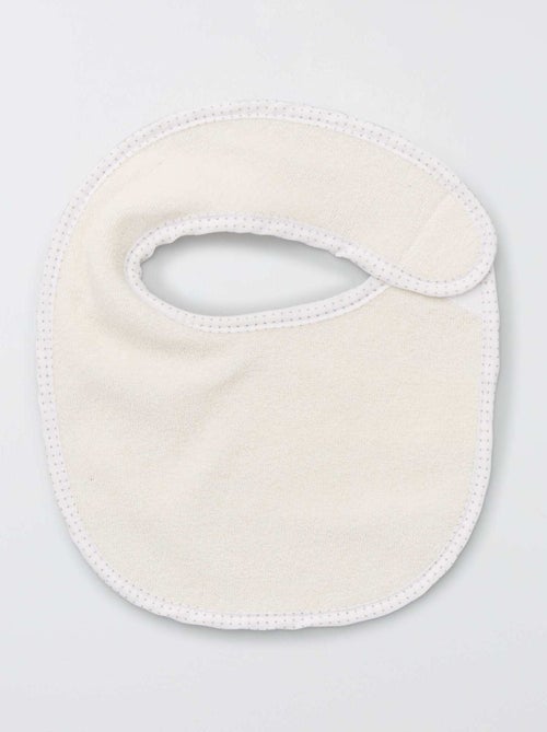 Pack de 7 baberos de rizo con velcro - Kiabi Pack de 7 baberos de rizo con velcro - Kiabi