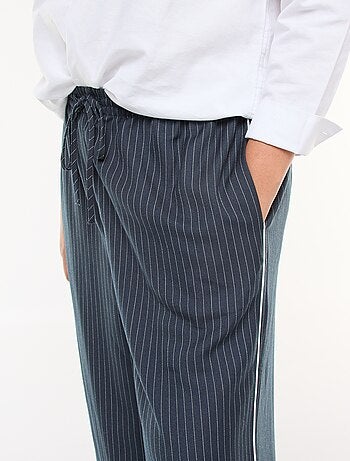 Pantalón ancho a rayas con cintura elástica