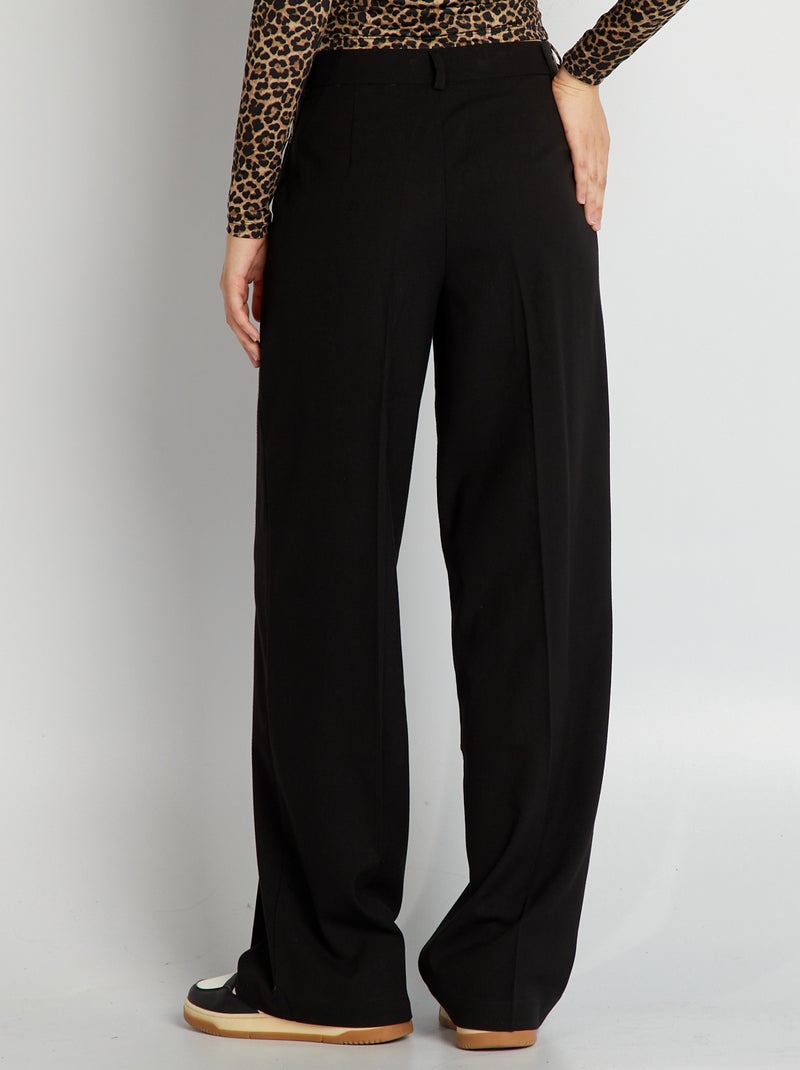 Pantalón ancho a rayas negro - Kiabi