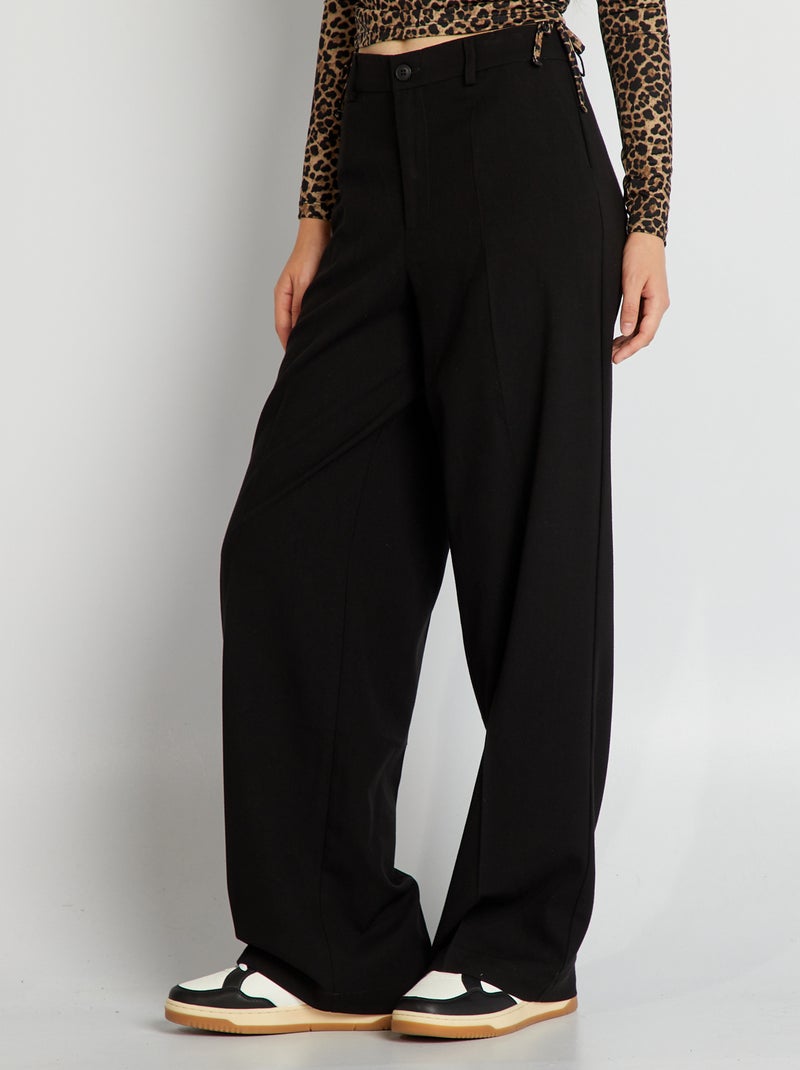 Pantalón ancho a rayas negro - Kiabi