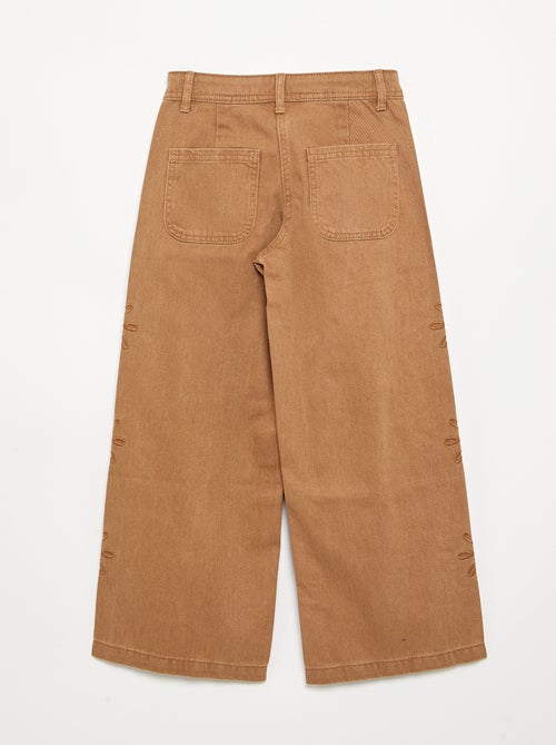 Pantalón ancho con bordados de 'flores' - Kiabi