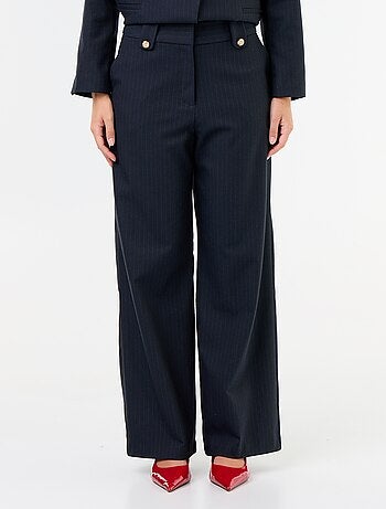 Pantalón ancho con botones dorados