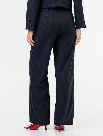 Pantalón ancho con botones dorados