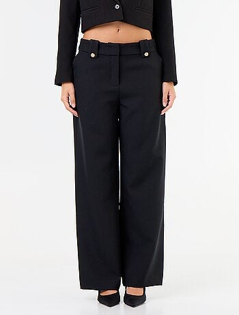Pantalón ancho con botones dorados