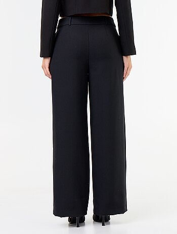 Pantalón ancho con botones dorados