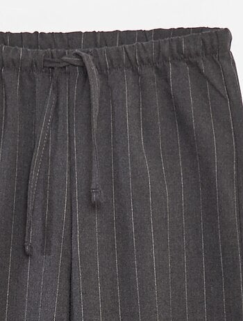 Pantalón ancho con cintura elástica y 2 bolsillos