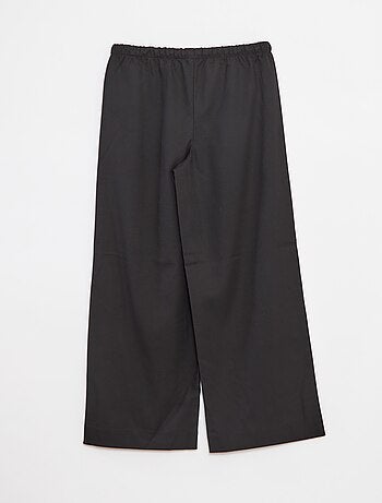 Pantalón ancho con cintura elástica y 2 bolsillos