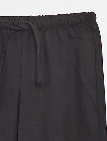 Pantalón ancho con cintura elástica y 2 bolsillos