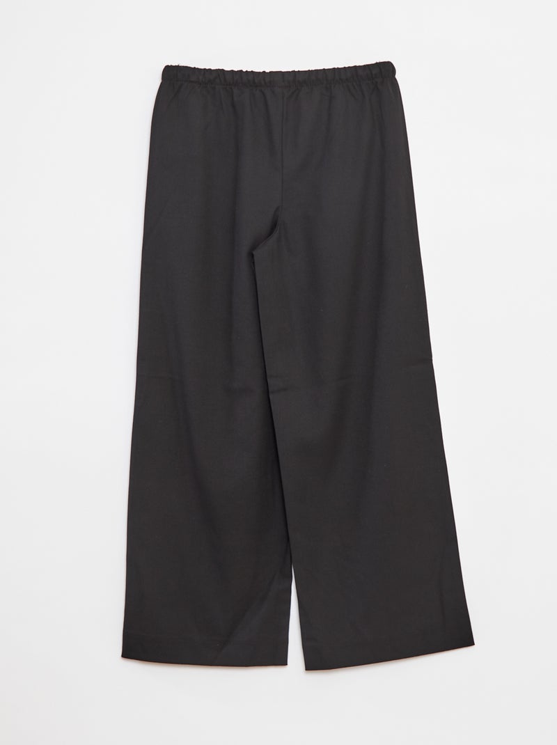 Pantalón ancho con cintura elástica y 2 bolsillos negro - Kiabi