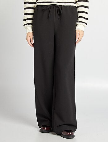 Pantalón ancho con cintura elástica y cordones ajustables