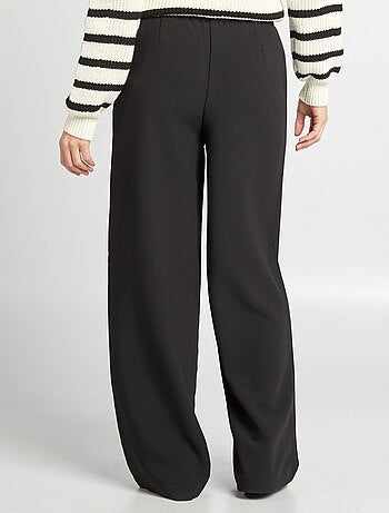 Pantalón ancho con cintura elástica y cordones ajustables