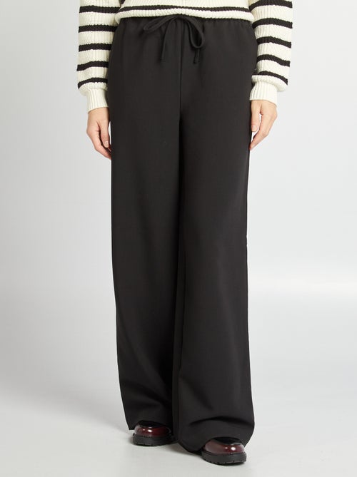 Pantalón ancho con cintura elástica y cordones ajustables - Kiabi