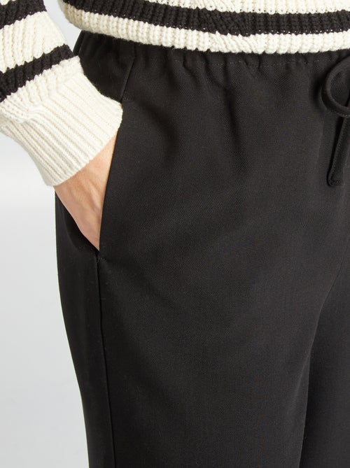 Pantalón ancho con cintura elástica y cordones ajustables - Kiabi