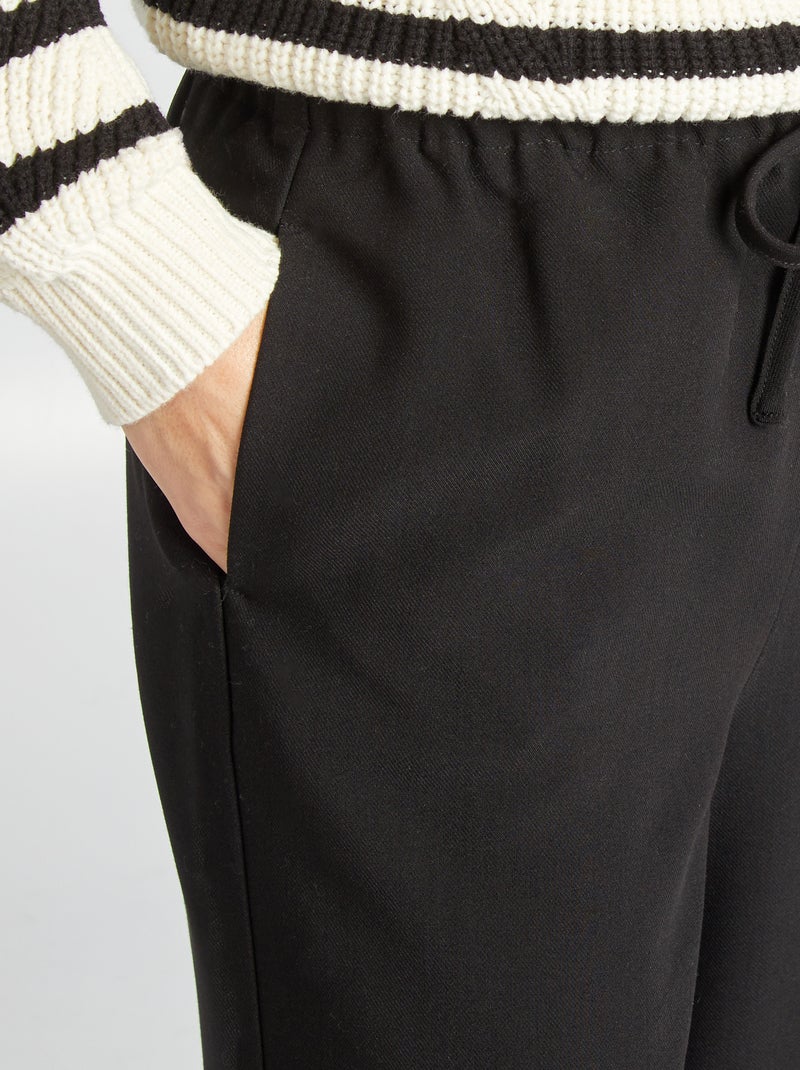 Pantalón ancho con cintura elástica y cordones ajustables negro - Kiabi