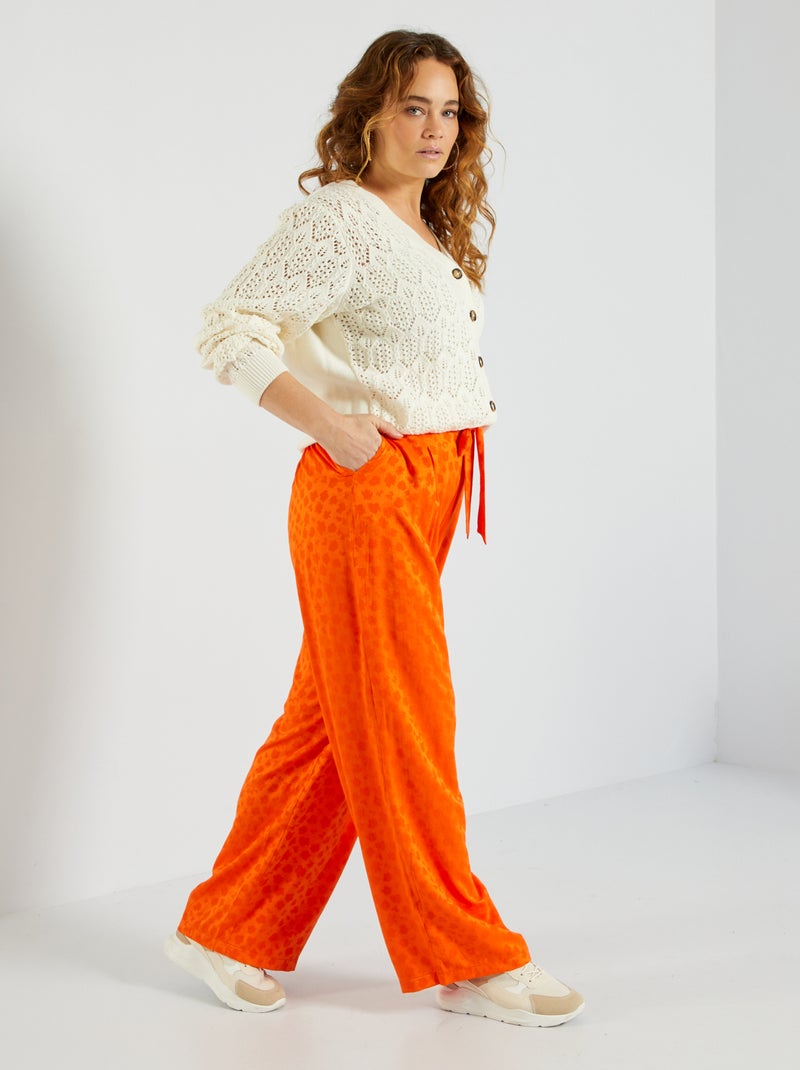 Pantalón ancho con estampado de flores naranja - Kiabi