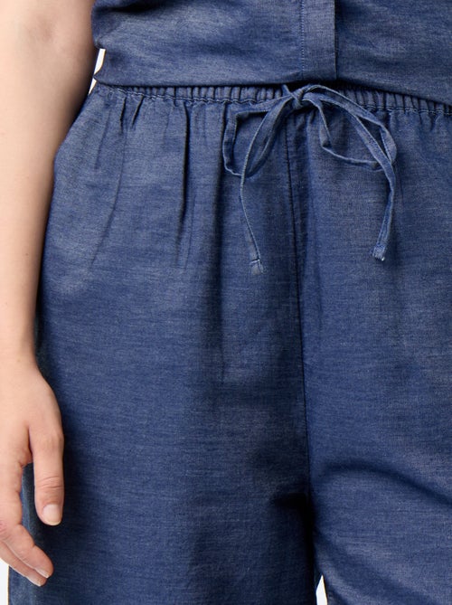 Pantalón ancho con estampados bordados - Kiabi