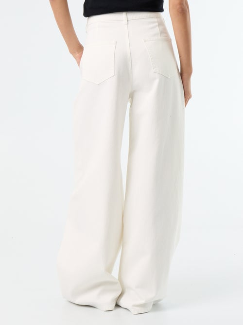 Pantalón ancho con pinzas y botones en la cintura - Kiabi Pantalón ancho con pinzas y botones en la cintura - Kiabi