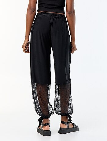 Pantalón ancho de corte globo con bajo de encaje