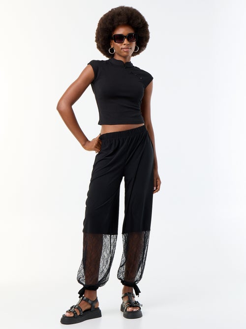 Pantalón ancho de corte globo con bajo de encaje - Kiabi