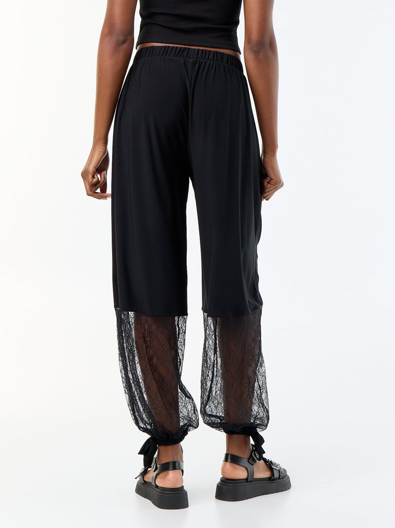 Pantalón ancho de corte globo con bajo de encaje Negro - Kiabi